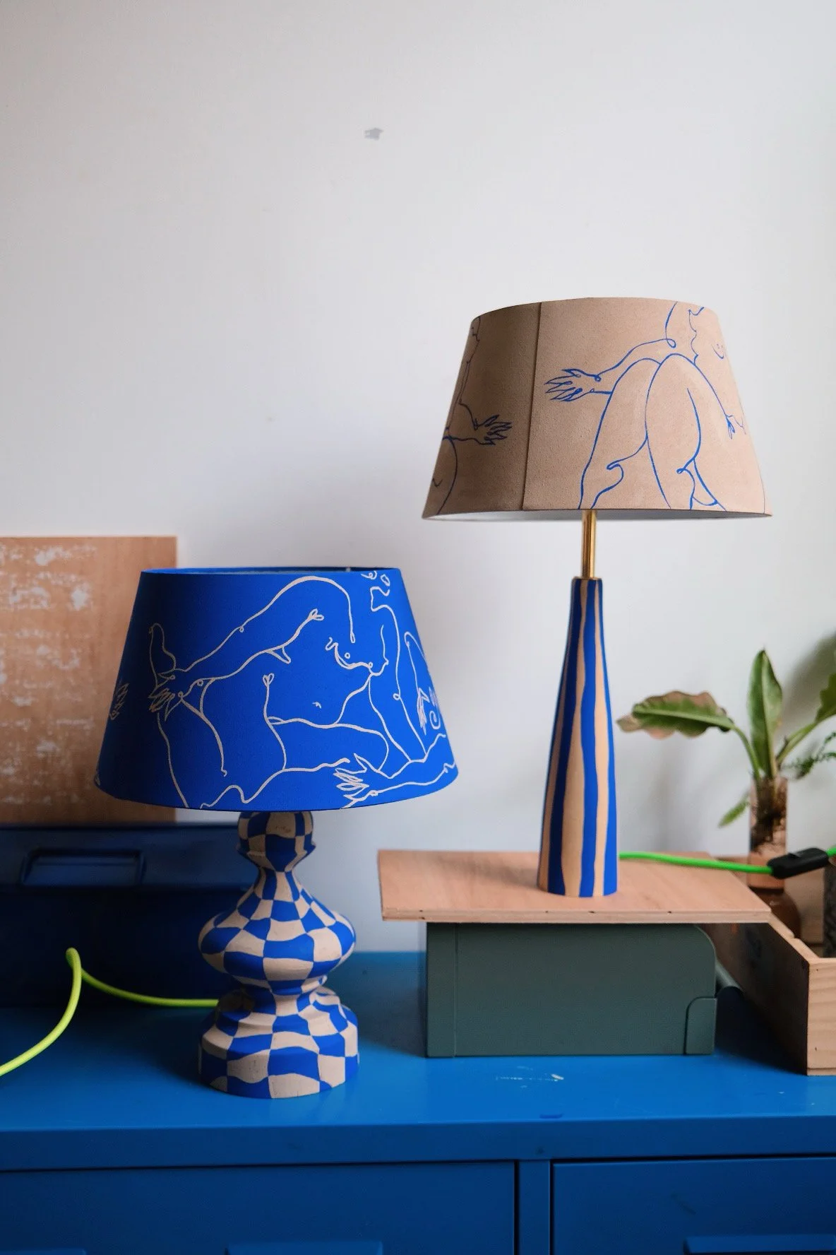 Laxmi Hussain — hand-painted lamps with blue body line drawings