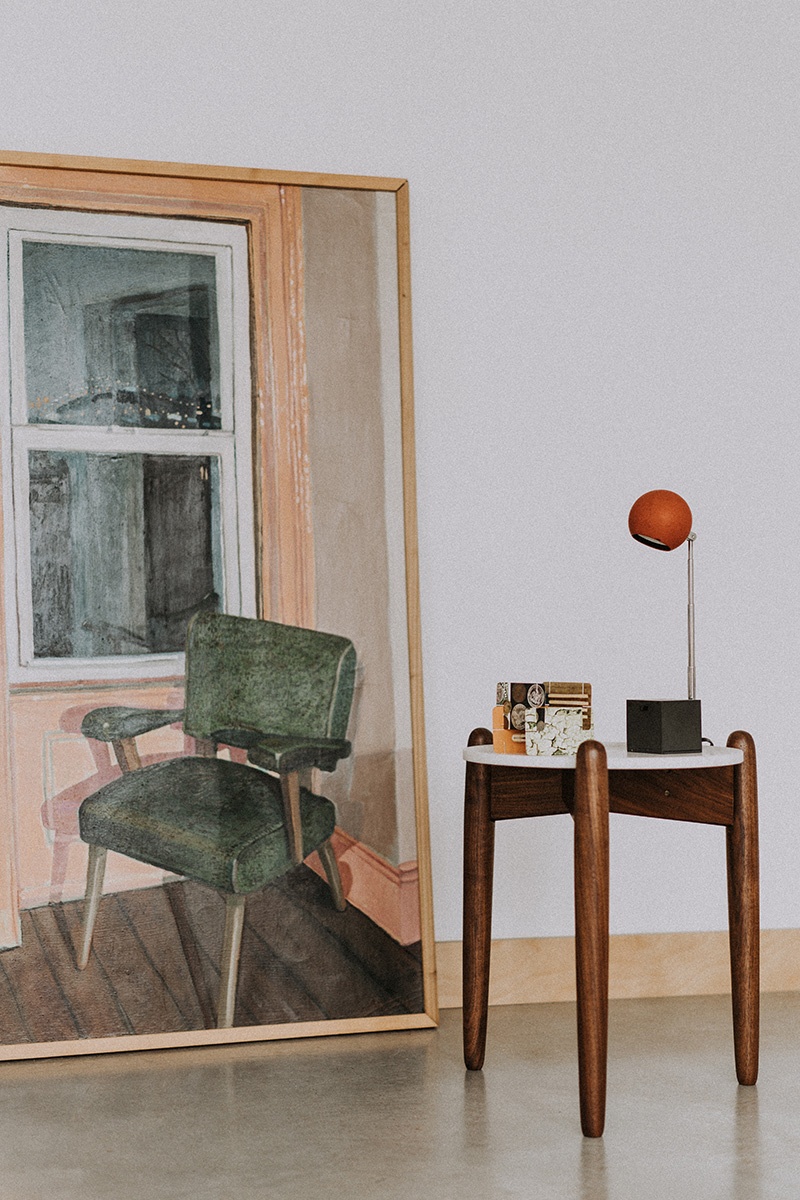 WAS Studios — painting, side table, orange lamp